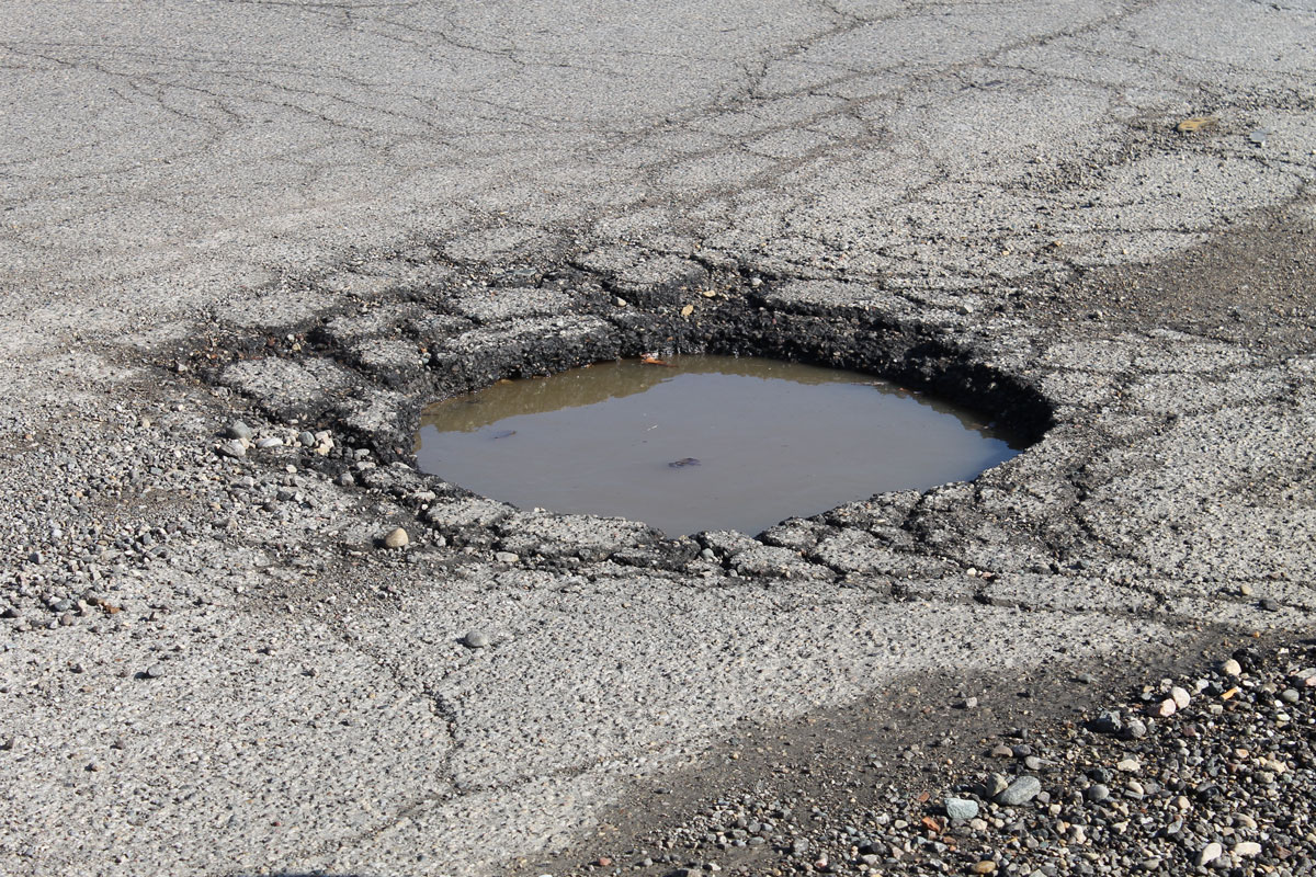 pothole-car-damage.jpg